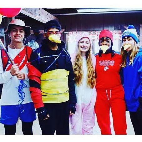 Themed tubing competition at a youth group winter retreat