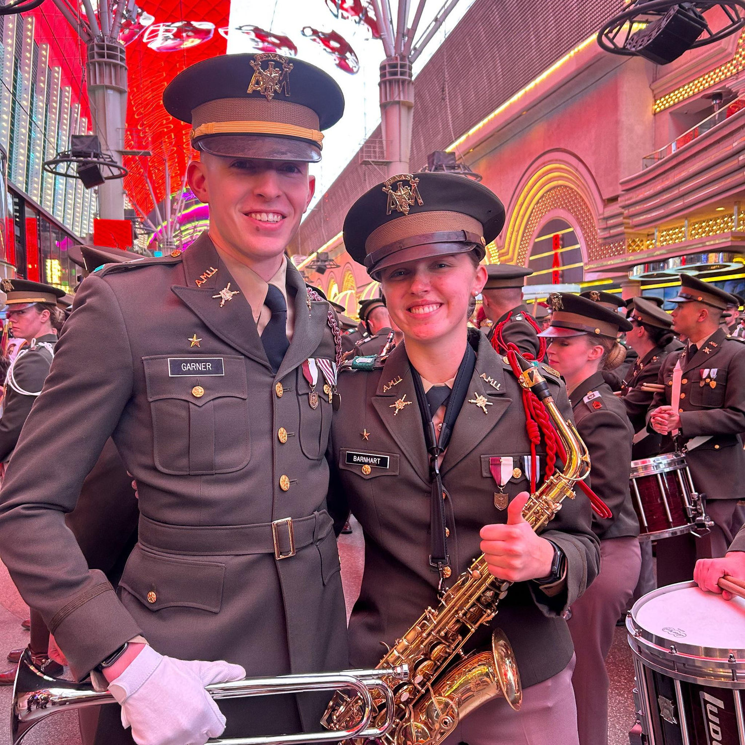 We marched with the band at the bowl game in Las Vegas- Here we are on Fremont Street and Jackson got to be on Bugle Rank!