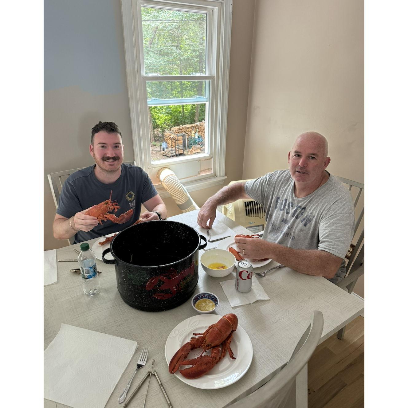 Alex with Chael's dad enjoying their catch of the day.