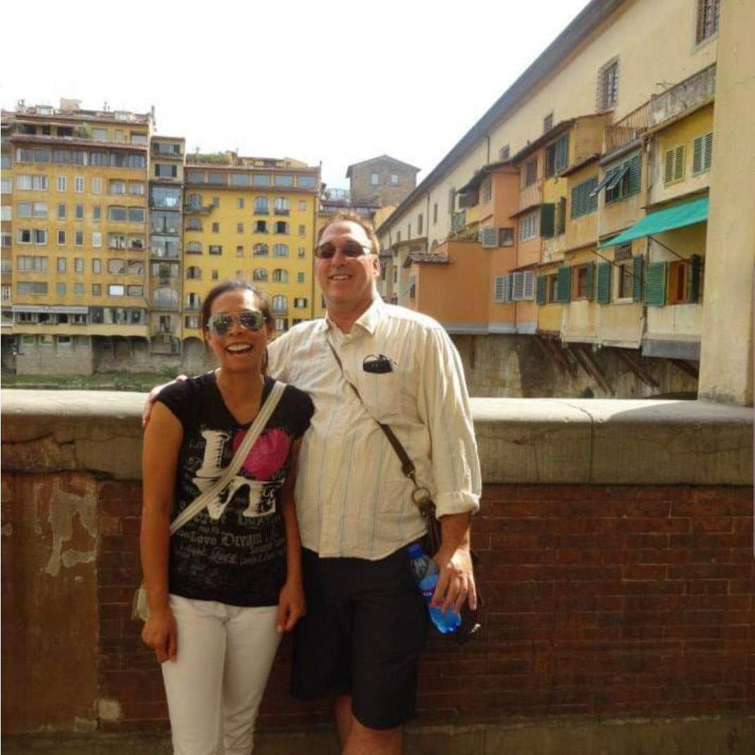 Walking around the city and taking a photo op by the Ponte Vecchio bridge. Florence, Italy 2013.