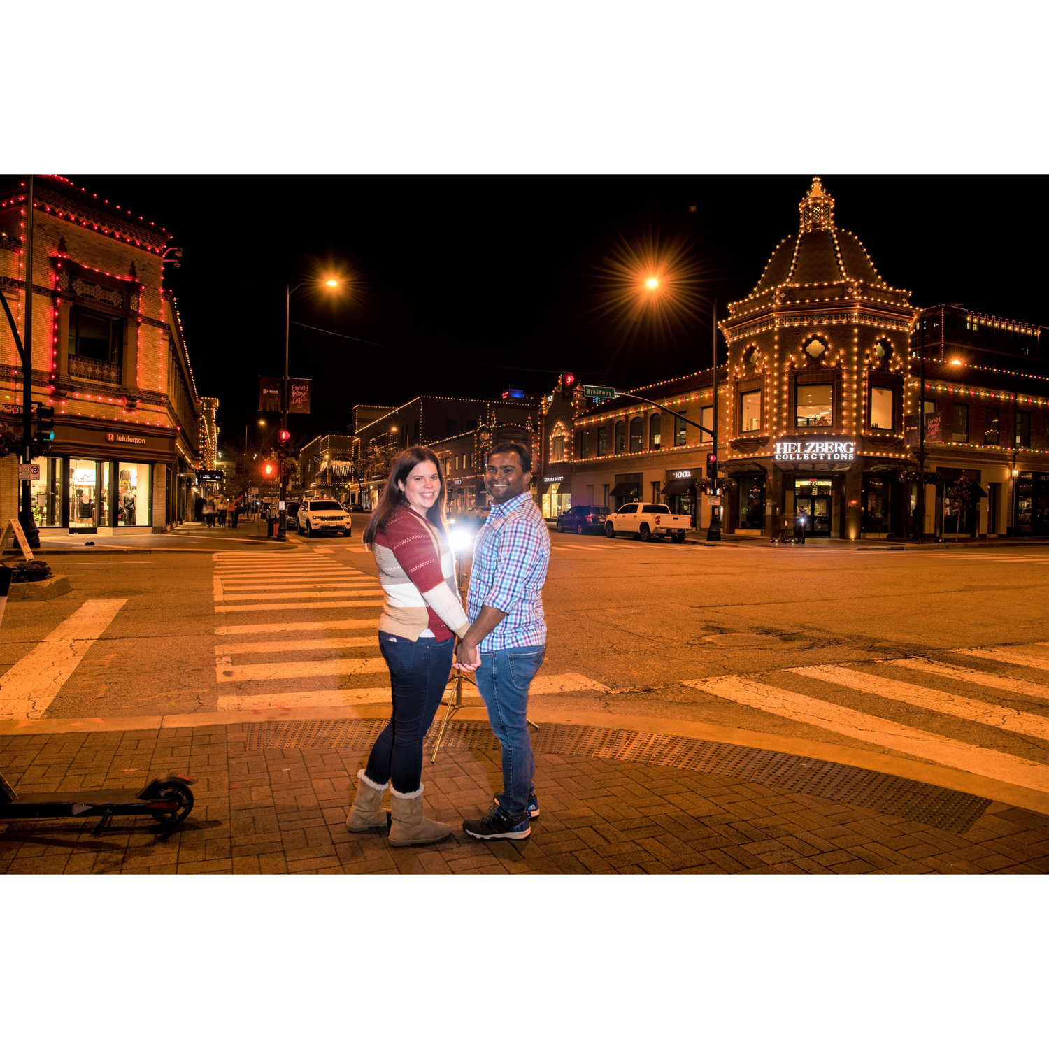 Engagement Photos at the Plaza with Christmas Lights. Photos by Vijay Ainapurapu.