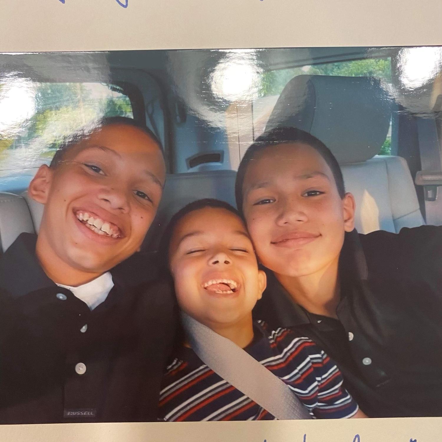 Cameron and two of his brothers, Matthu and Vinny
