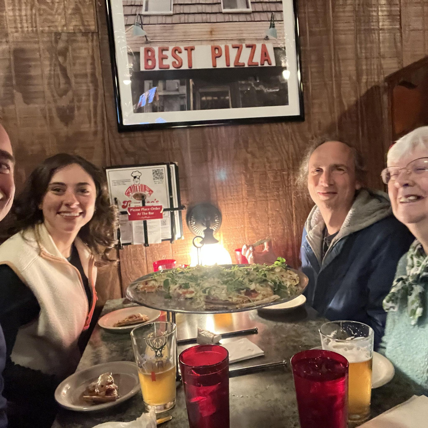 Out for pizza and enjoying Grandma's inappropriate jokes!