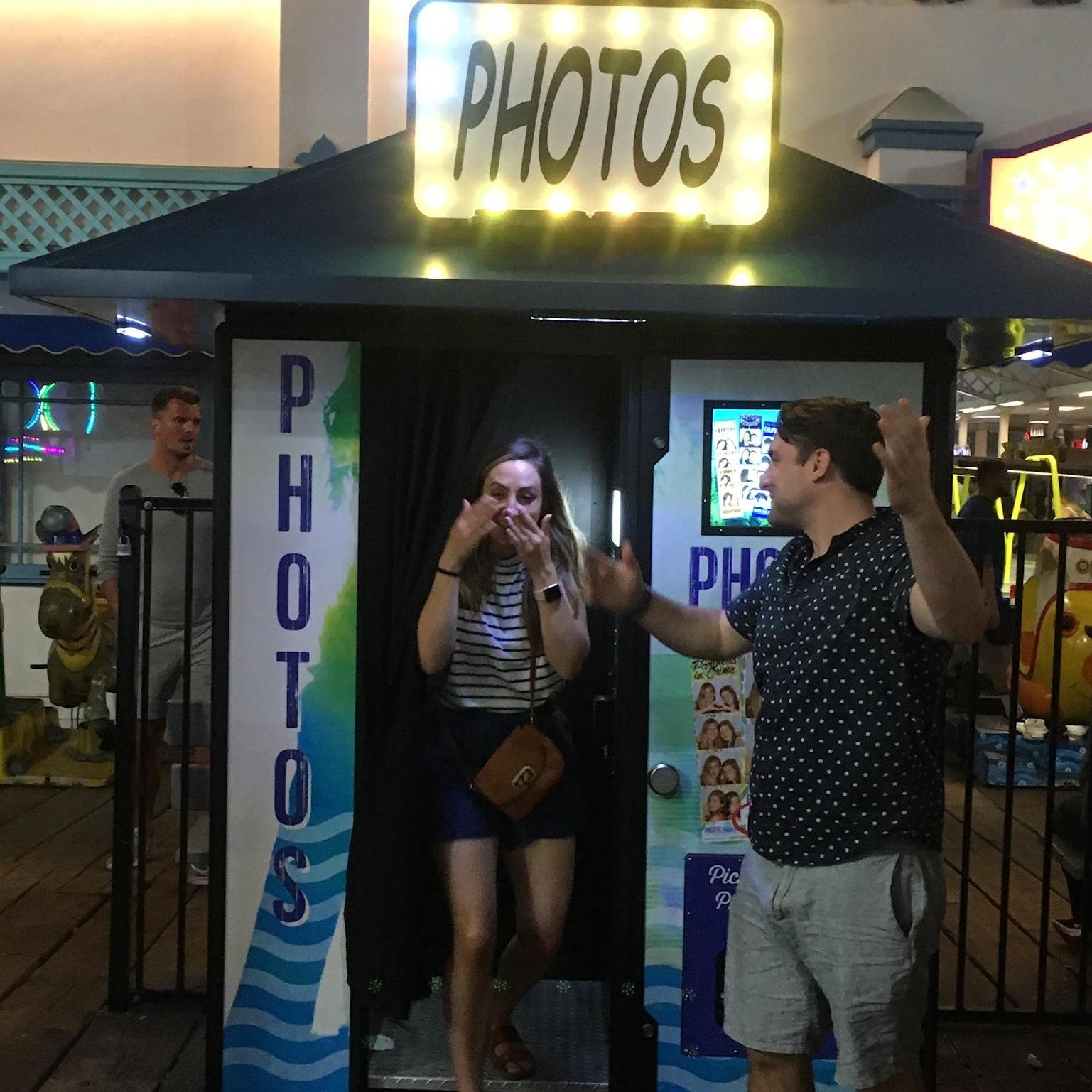 Right after Whitney said YES in the photo booth at the Santa Monica pier