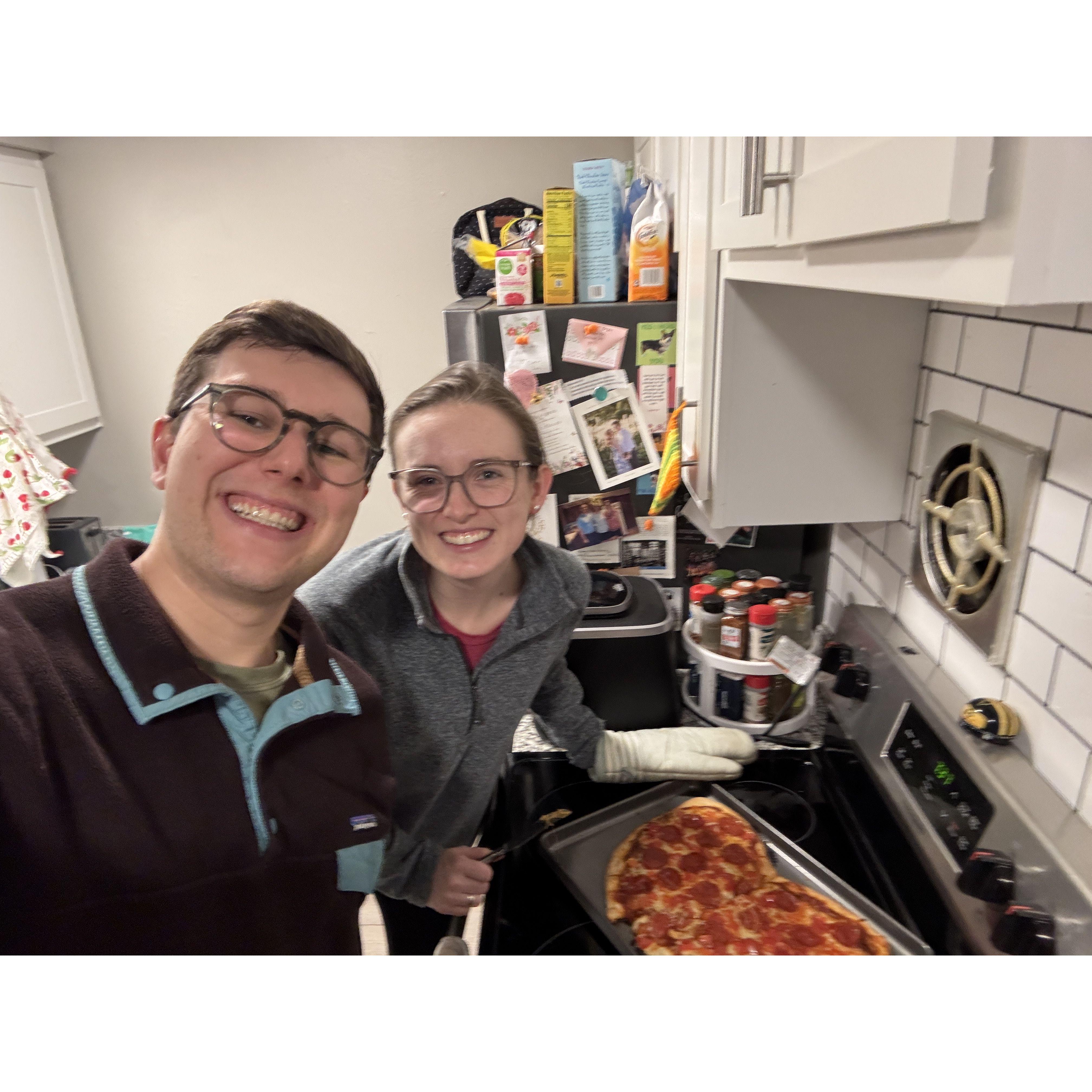 Making a heart shaped pizza, a Valentine's Day tradition.