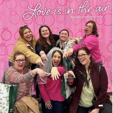 (Most) of the Bridal Party at the Pink Bridal Wedding Show.
