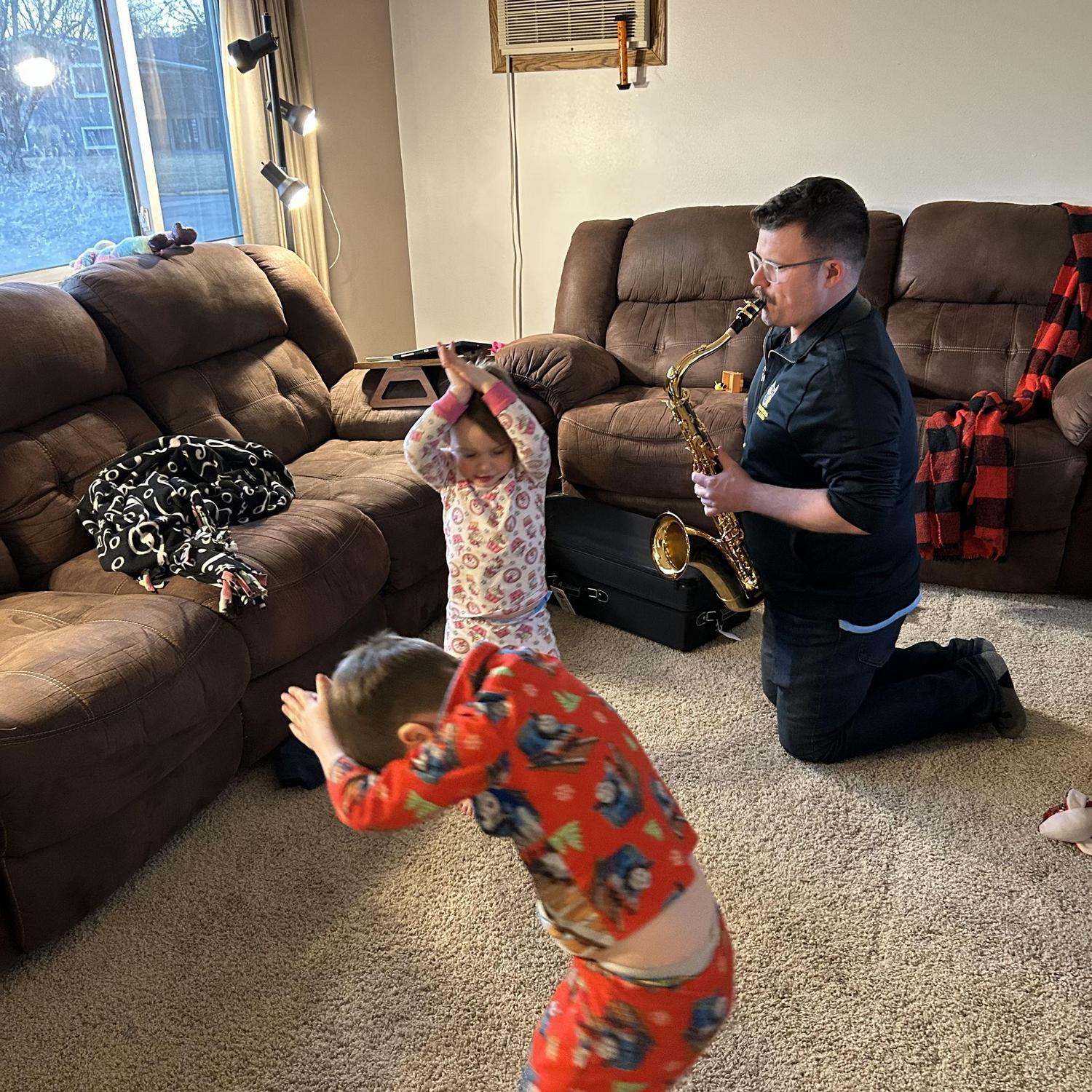 Dance parties while Antoine plays the saxophone.