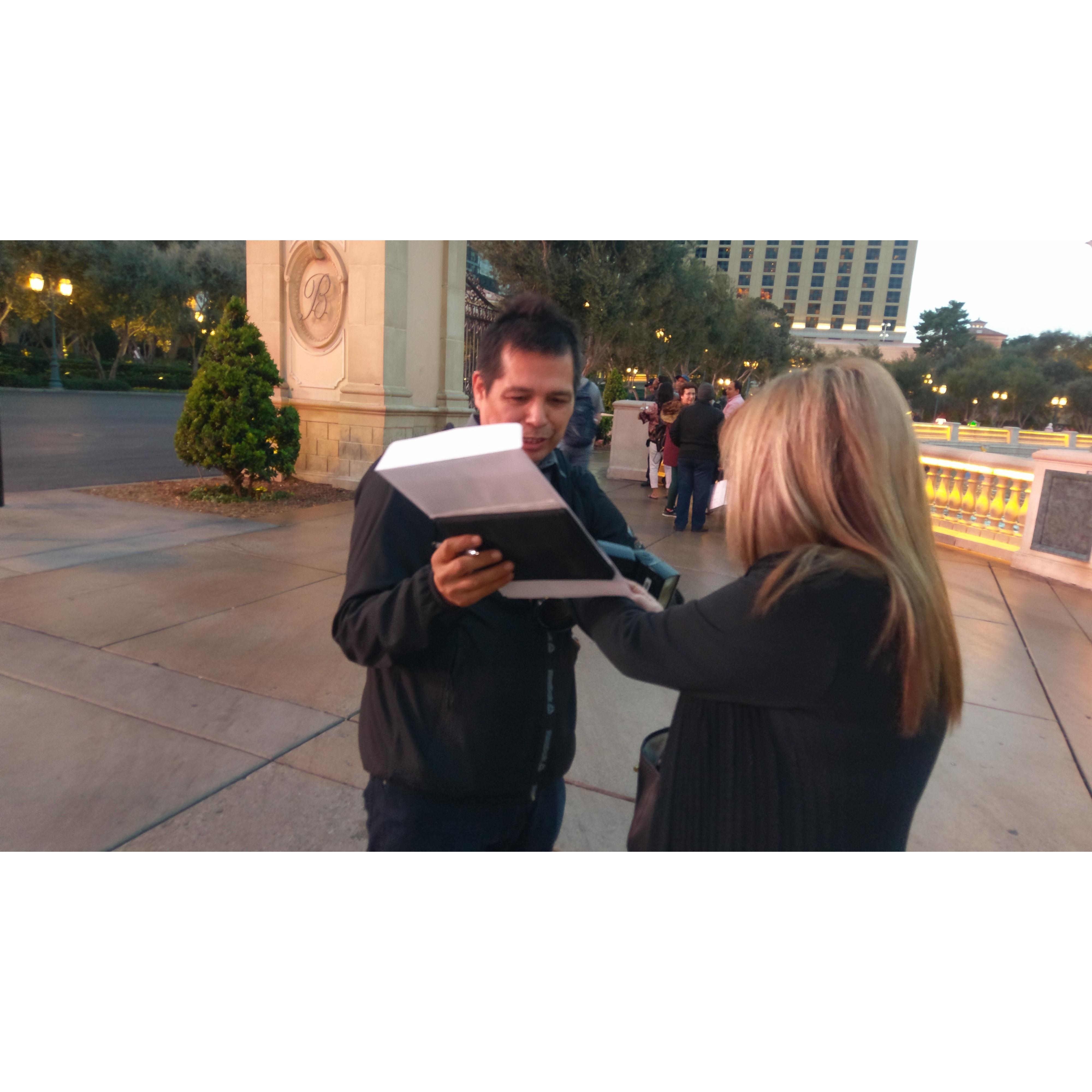 Our photographer signing as our witness