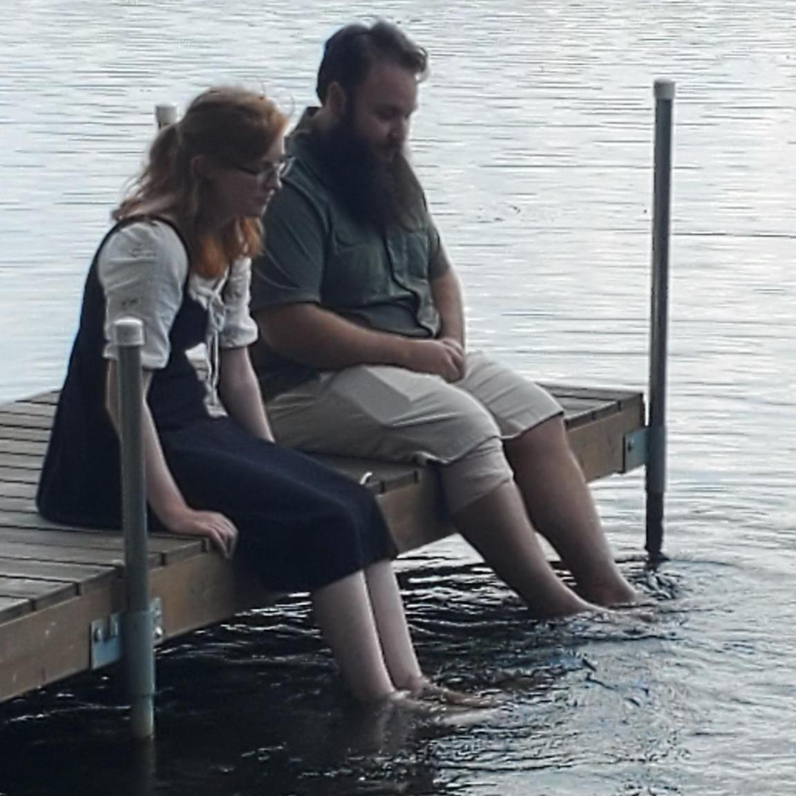 Noel and Amaris on a dock, surprisingly NOT fishing.