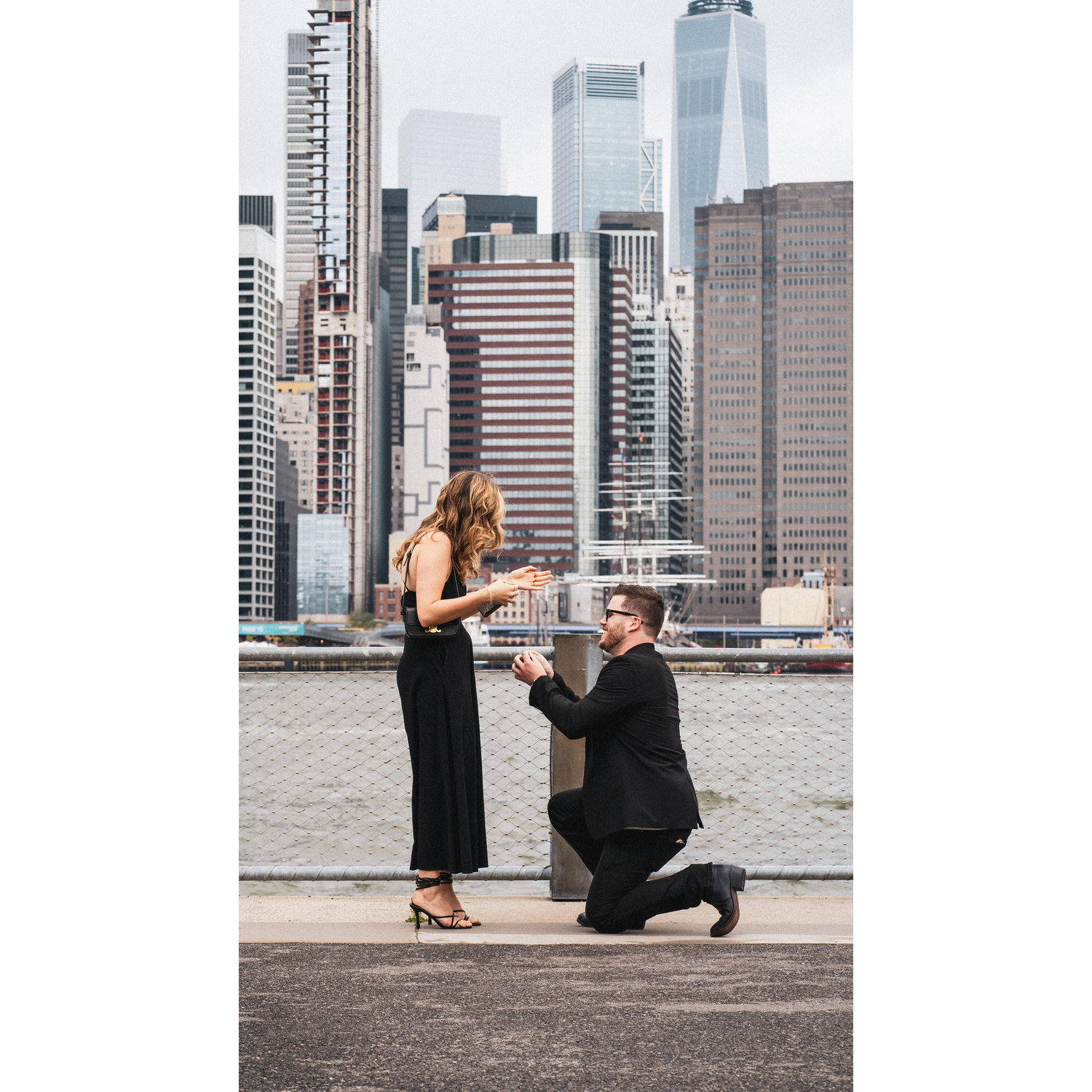 Michael proposed to Katie on June 24, 2023 at Brooklyn Bridge Park with all of her friends hiding in the bushes waiting to surprise her.