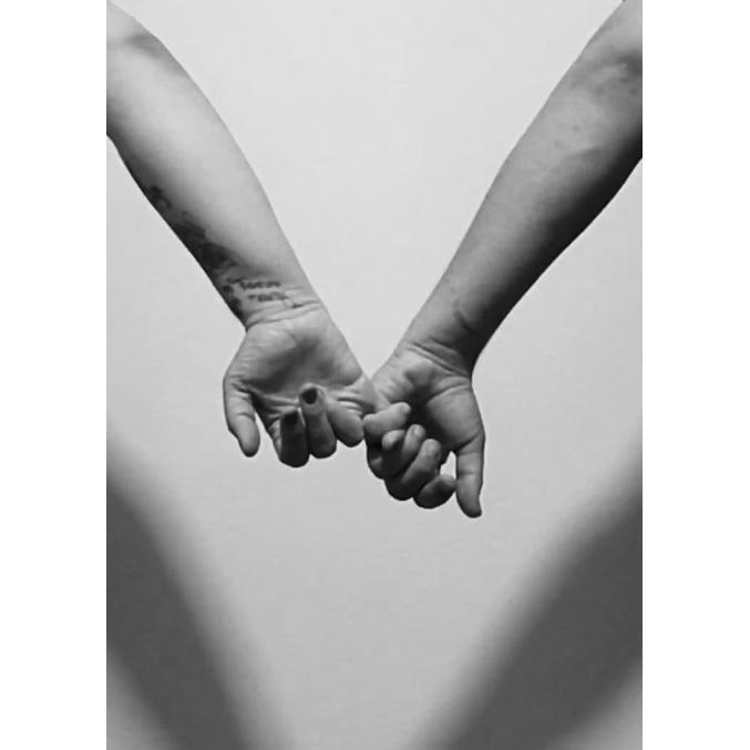 Real love is... walking around the house with your fiancé looking for good lighting to take a picture of your hands because she's weird :P