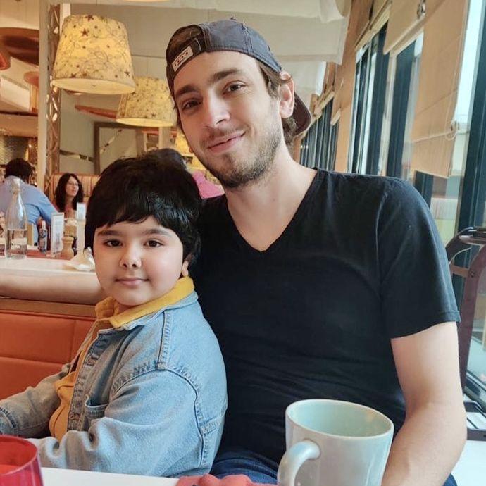 Sean with Mansi's nephew, Mivaan.