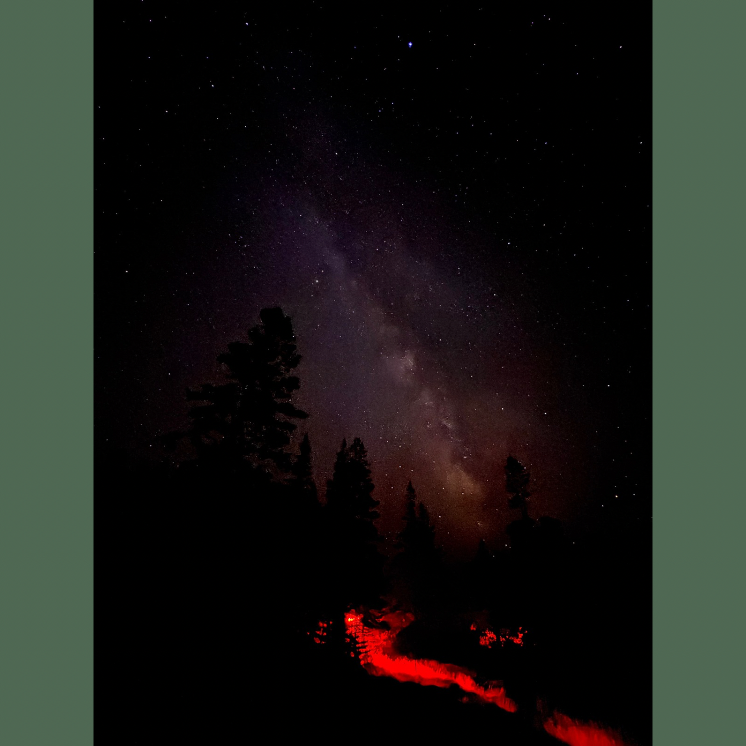 The long exposure shot combined with the red flashes of light from the lighthouse to create this fun image also captured by Marissa