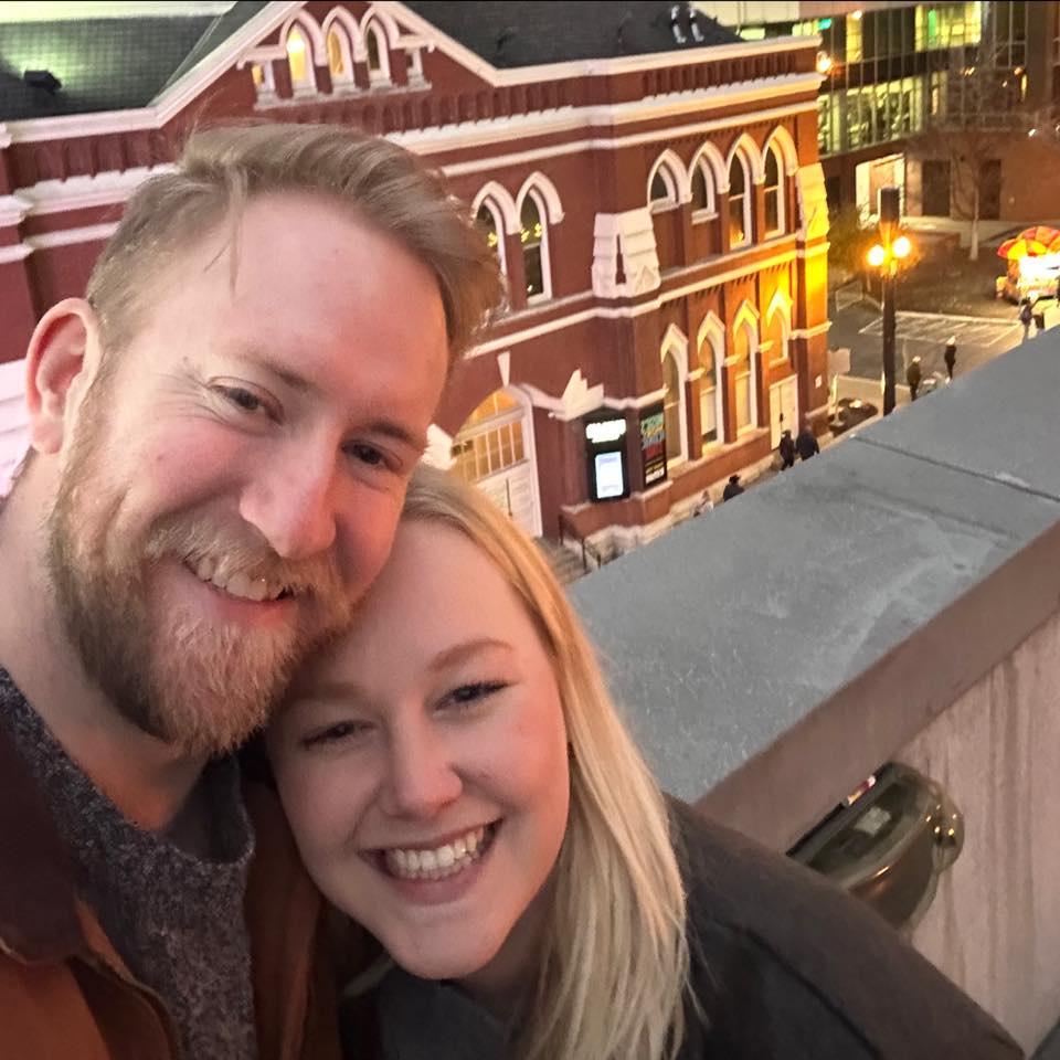 On the balcony in front of the Ryman, where Tucker would later propose to Peyton