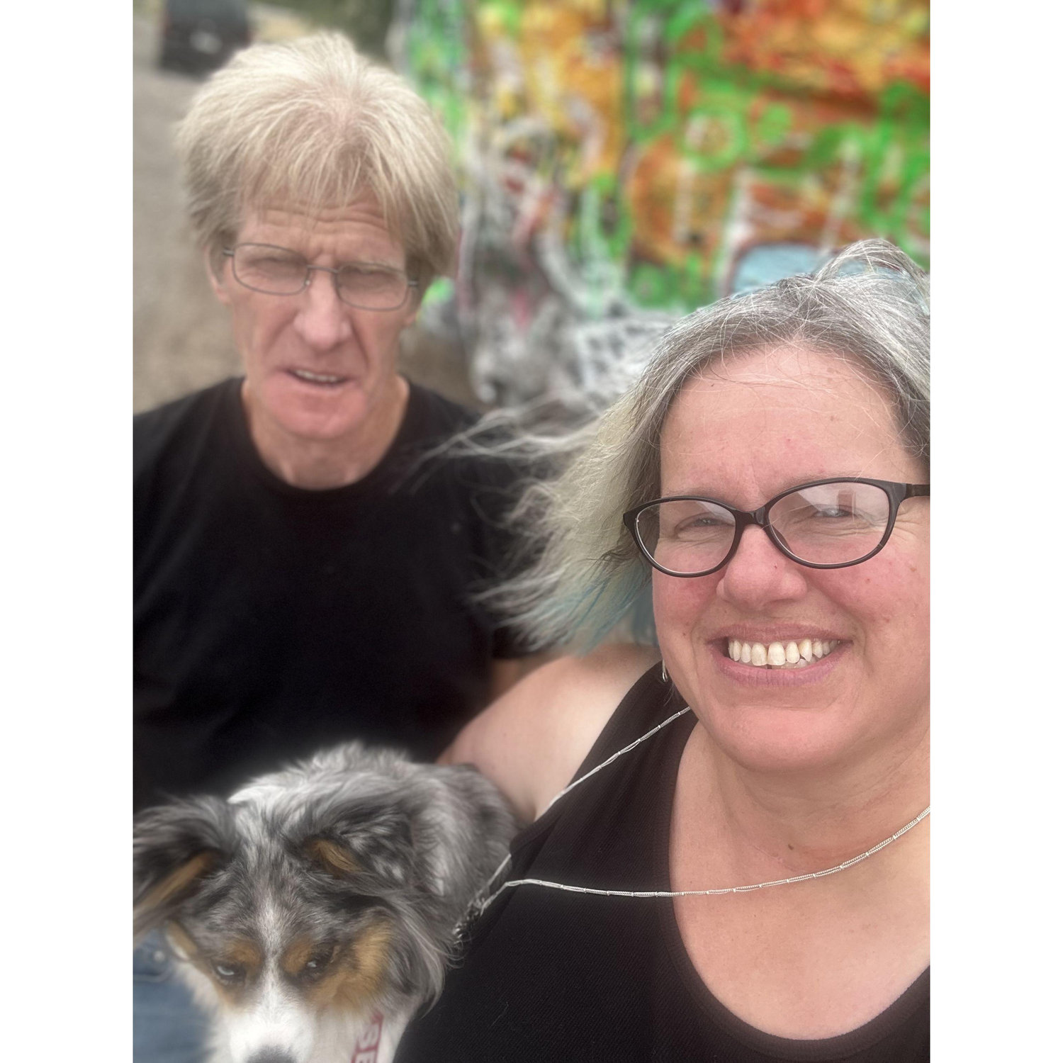 Snapped in the middle of a windgust outside of Roswell, NM, on our trip back from Phoenix for my daughter Hosanna's wedding. Fun graffiti rock in the background.