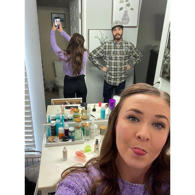 Taking silly pictures while getting ready for another Christmas party. December 25th, 2022