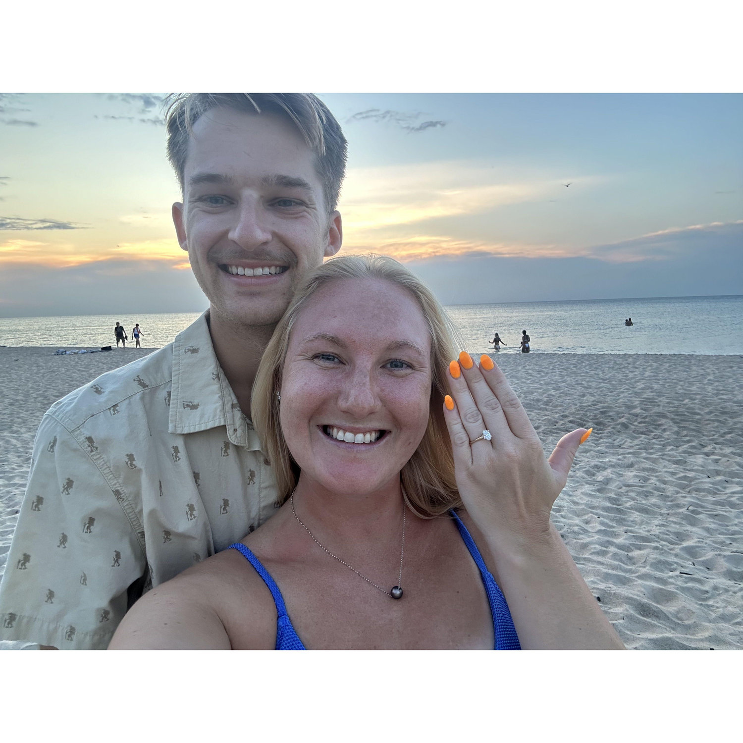 The day we got engaged! We bought our house the day before this, and planned a sunset picnic at the beach to celebrate. I turned around from setting out the beach blanket, and Logan was on one knee.