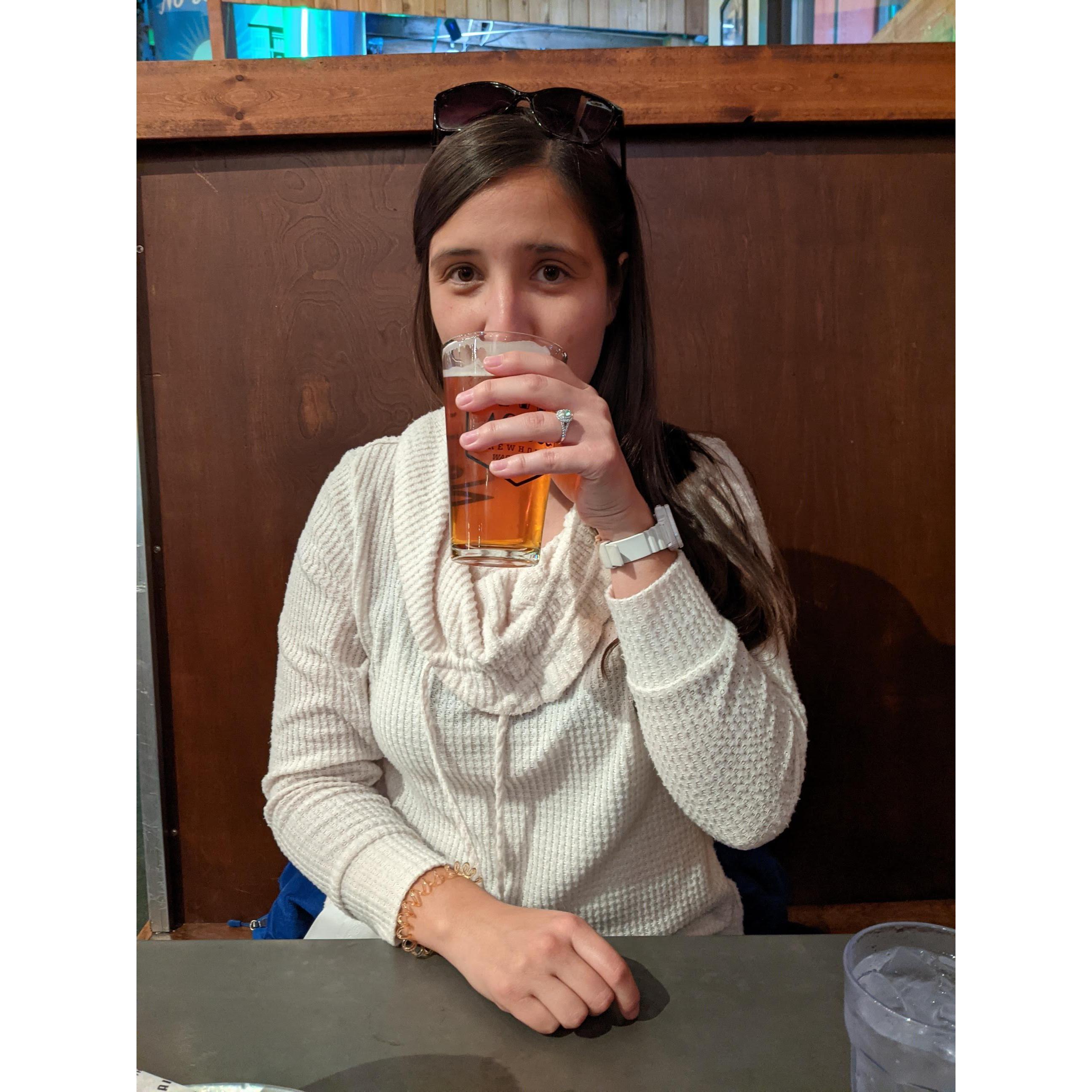 Amy enjoying a beer at No-Li Brewery a couple of hours after getting engaged.