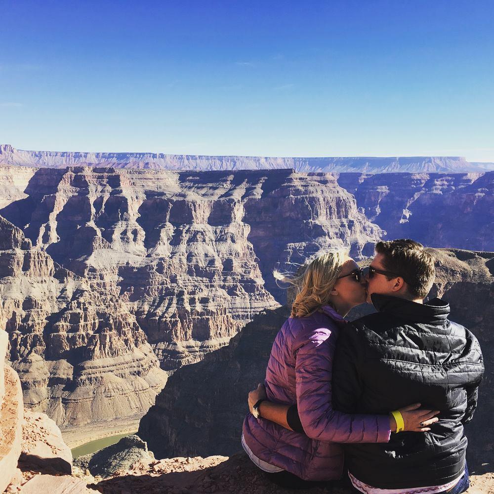 Stealing a kiss and taking in the sights at the Grand Canyon