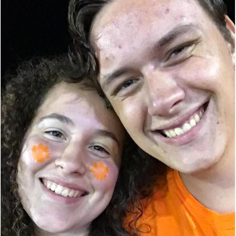 We took this picture at the first football game we went to together at our college. Taken September 21, 2019.