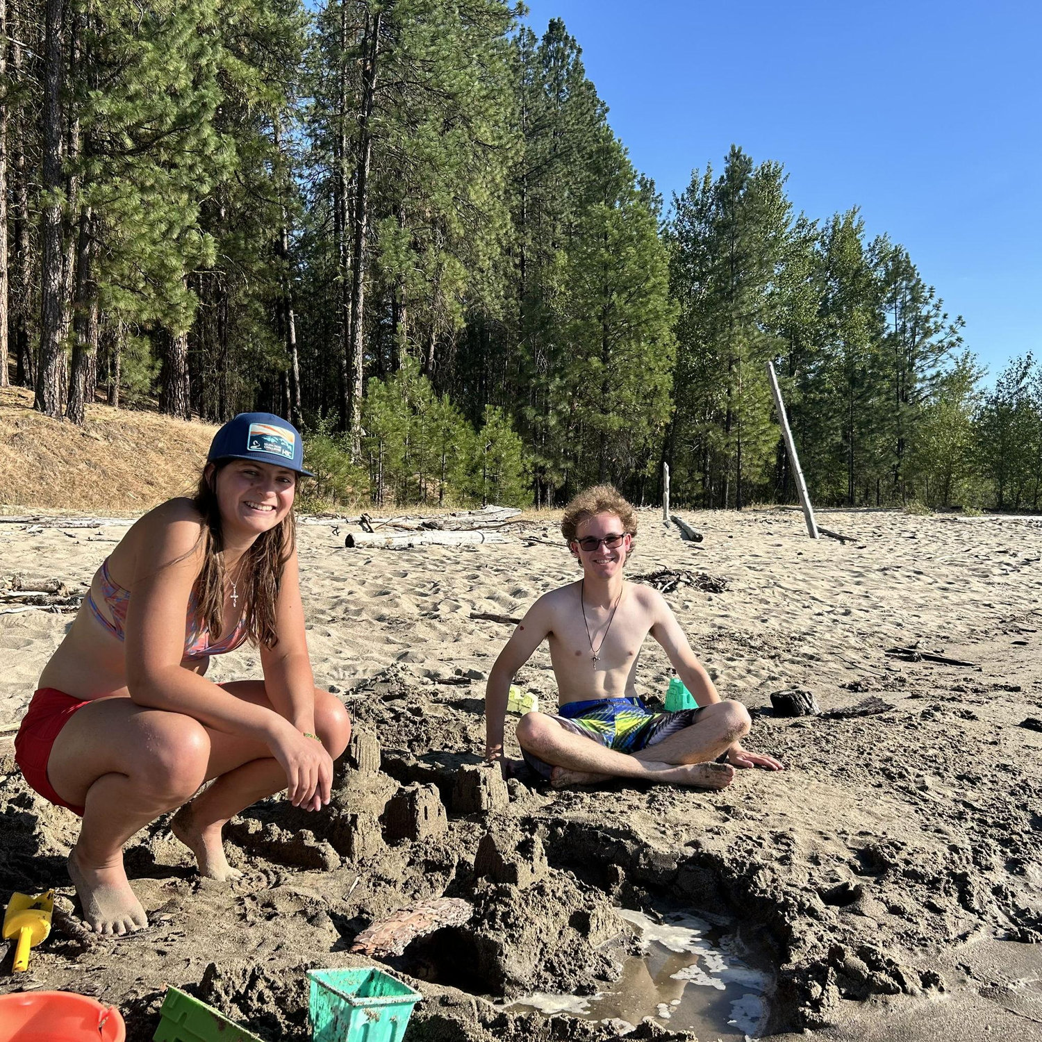Chris builds his first sandcastle.