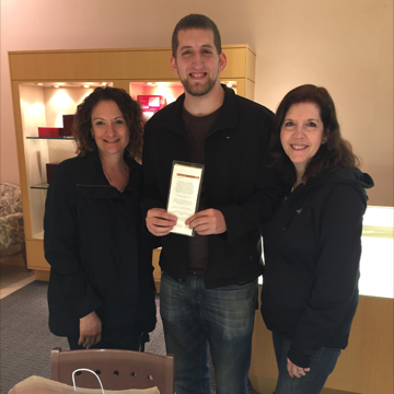 Brian getting the ring with both our moms!