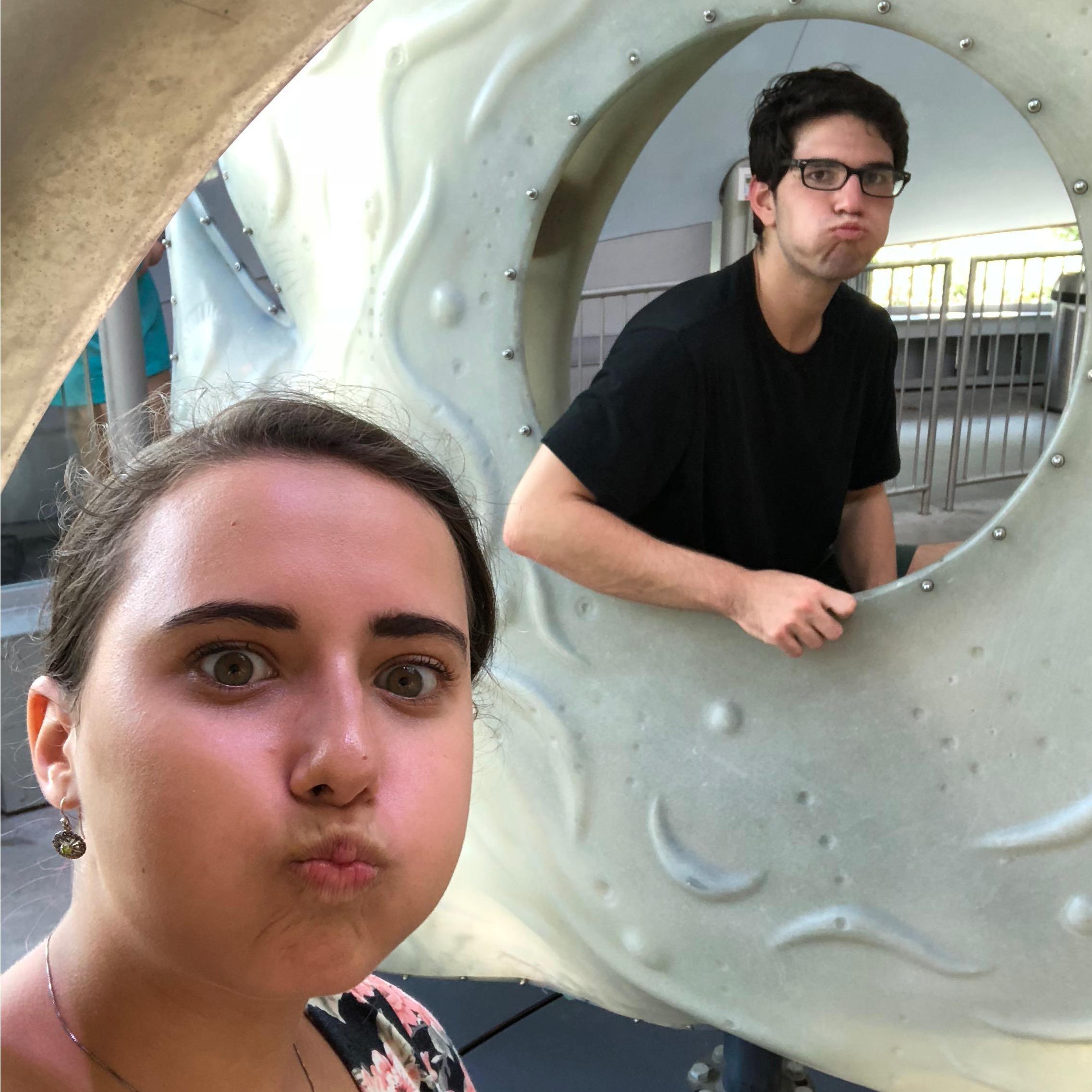 Goofing off on a carousel ride in New York when we were long distance.