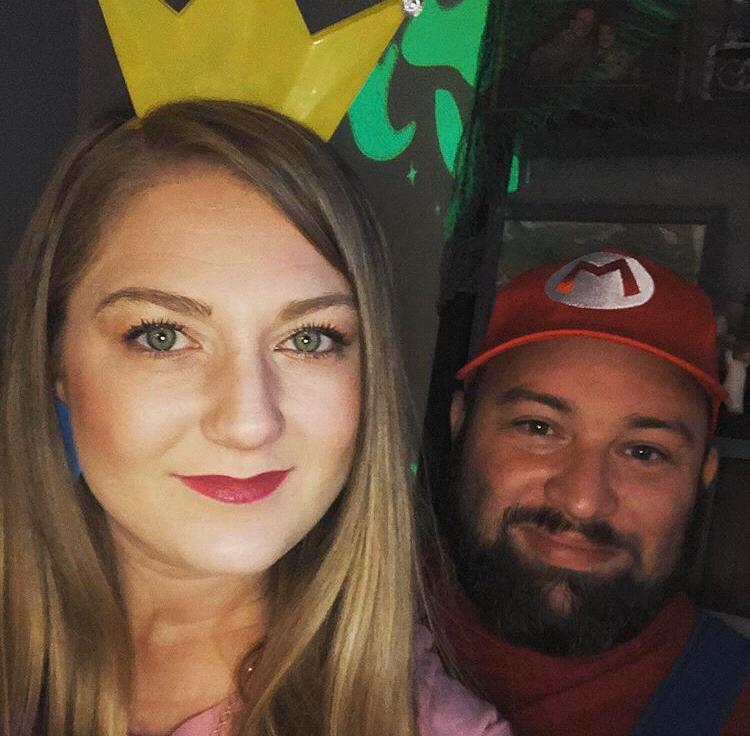 At a Halloween party dressed as Mario and Princess Peach.