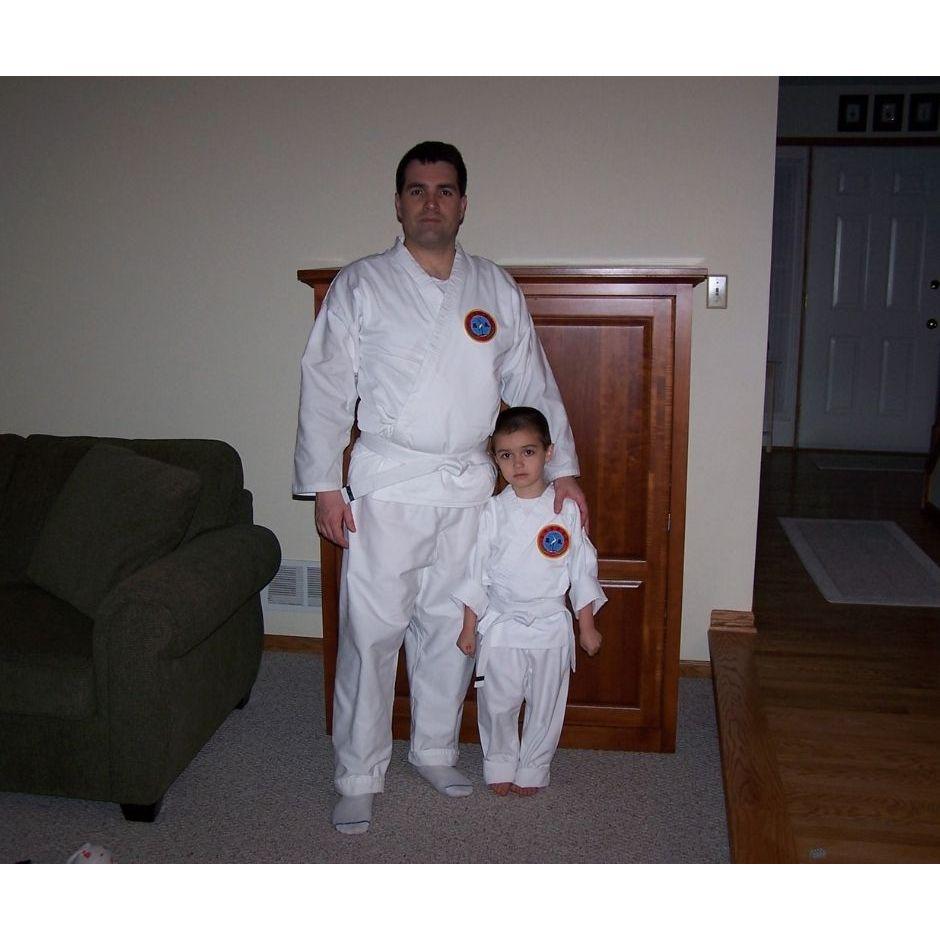 John and Dad in their Tae Kwon Do uniforms