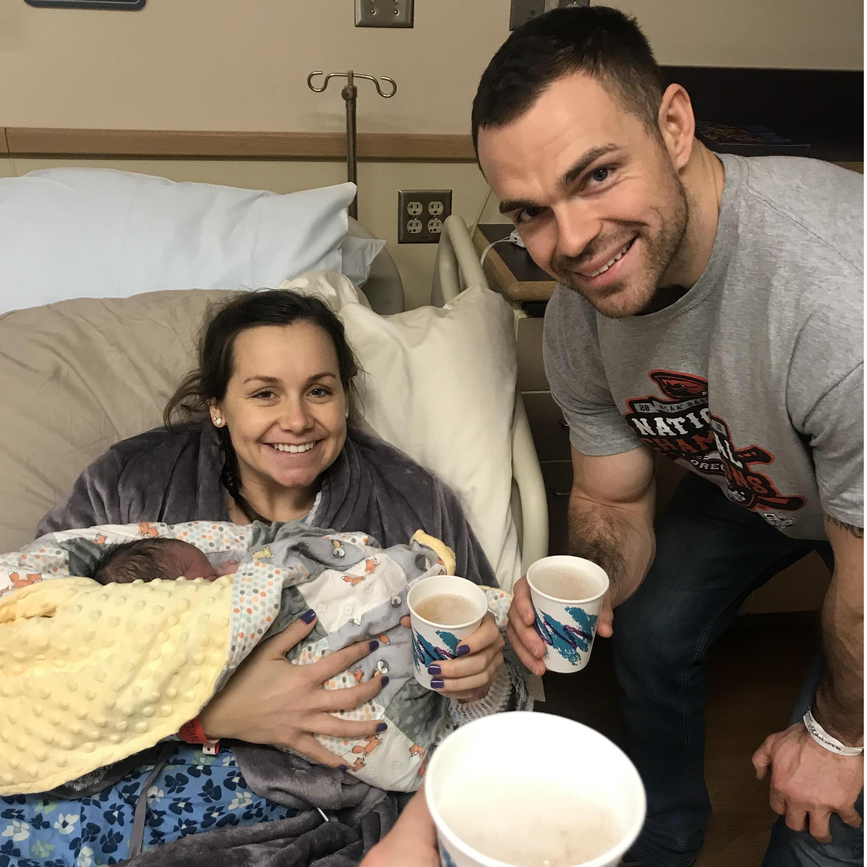 Time for Mom, Dad, and Auntie Anna to celebrate, because Holly Jayne Huggins is here!
