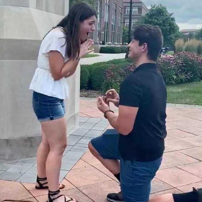 The big proposal under the Purdue arch on their 7th anniversary. They have shared so many memories and friendships at Purdue that will last a lifetime. They are so thankful for the Purdue Gang!