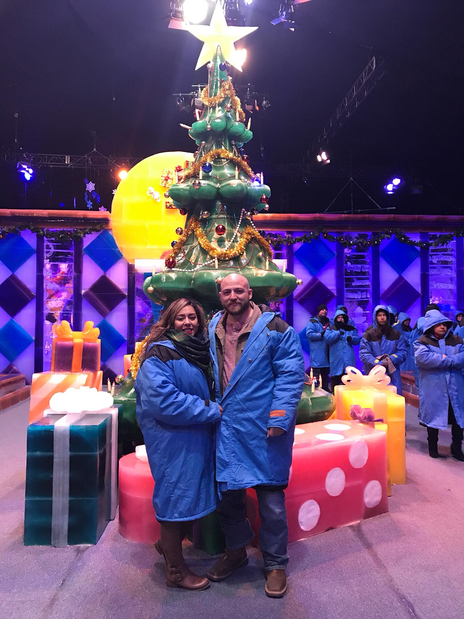 Someone tell this dude that coats are suppose to be button up when you're in below zero temps. Gaylord Texan Ice Exhibit