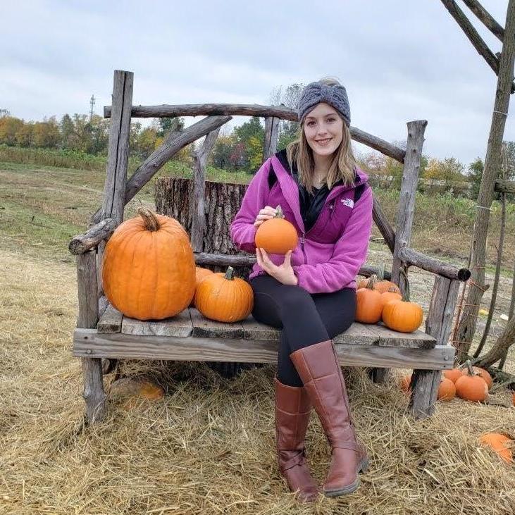 Monica at the pumpkin patch 2019