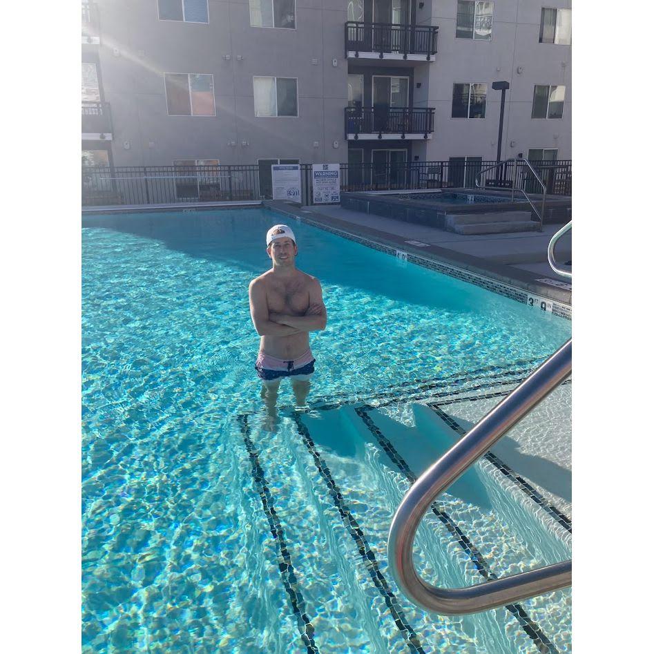Doug tries to pretend it's still summer at the pool