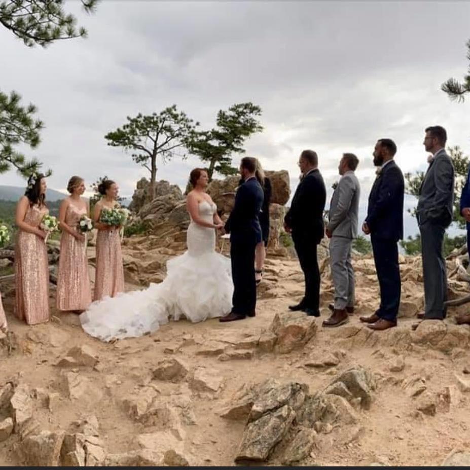 We got married 6.18.20 at Lookout Gulch in Boulder, CO while standing in the rain!