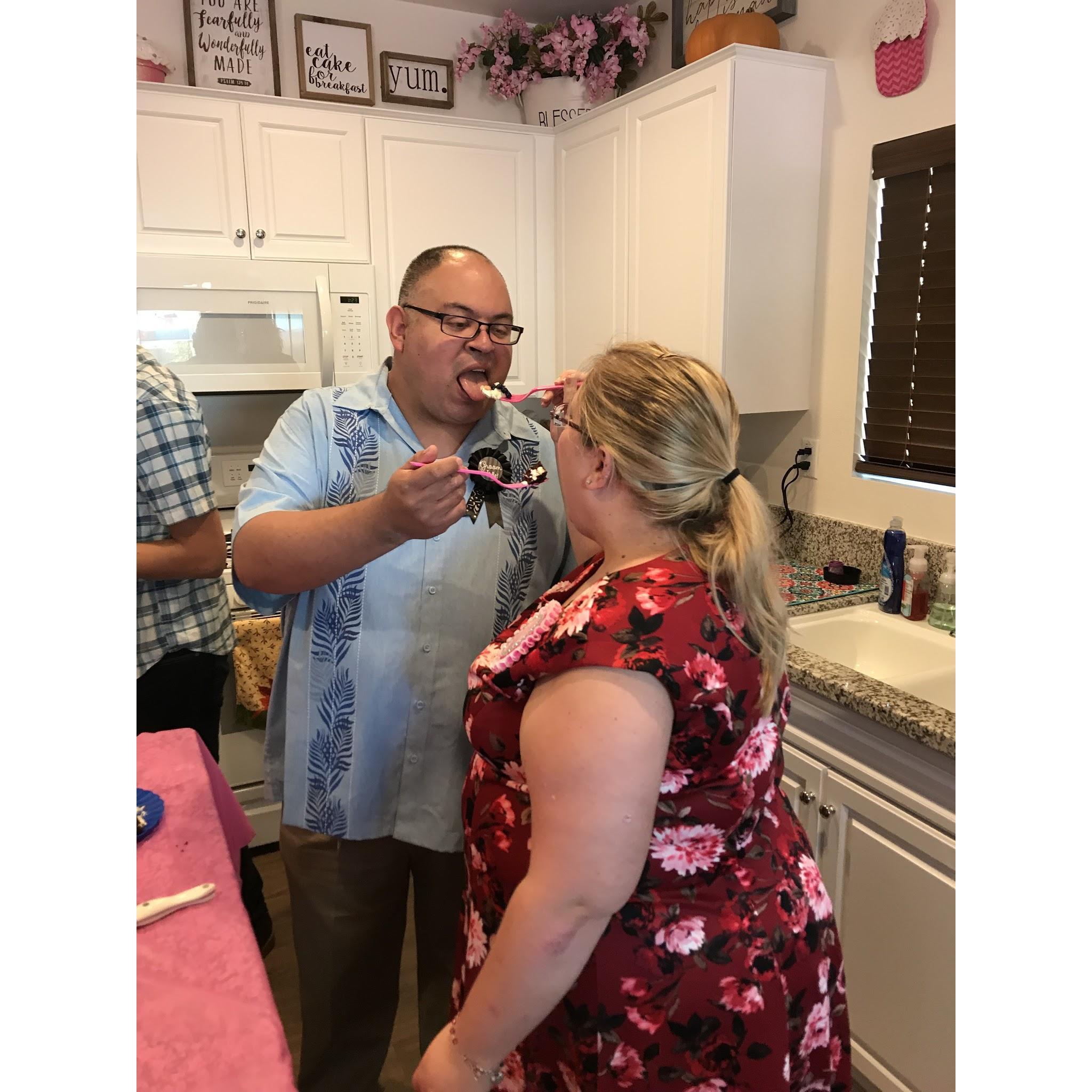 They wanted us to practice feeding each other cake before our wedding.