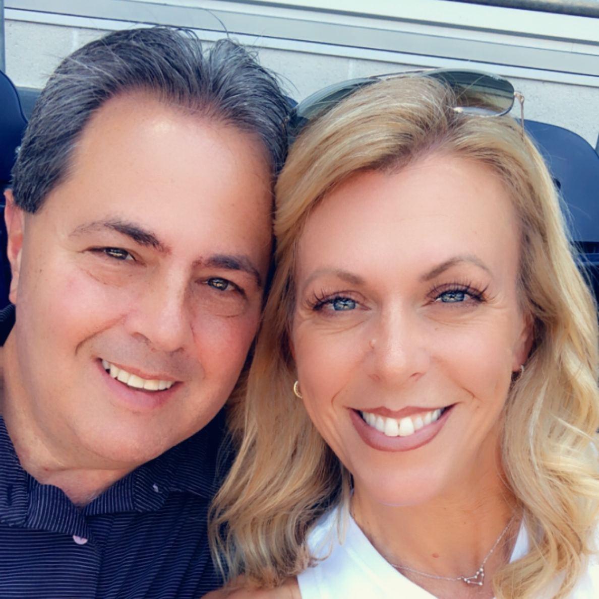 enjoying a baseball game together