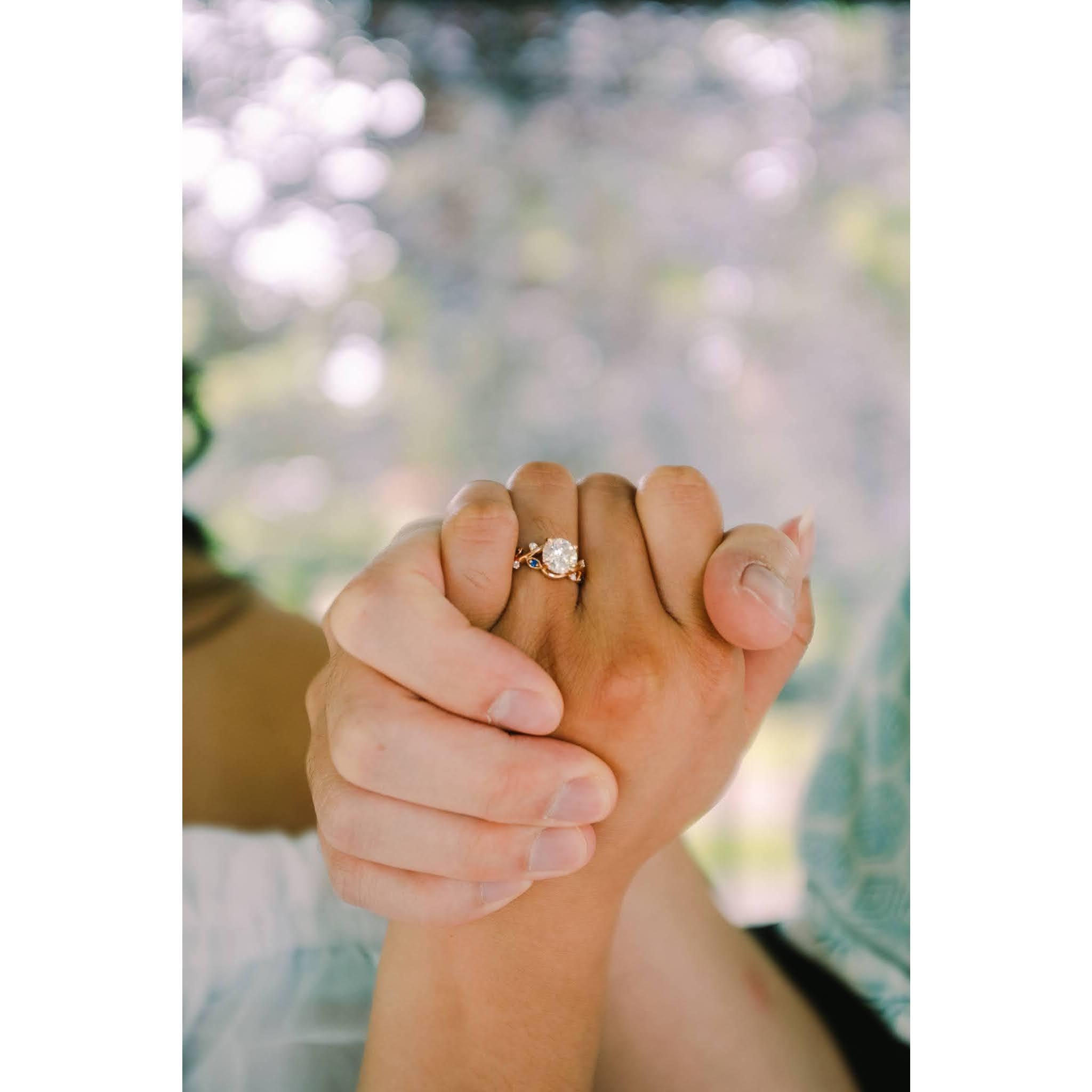 The ring, for better reference the ring is rose gold with a leaf/vine pattern with my birth stone and diamonds on the leaves! My birthstones are sapphires which is one of my favorite shades of blue!