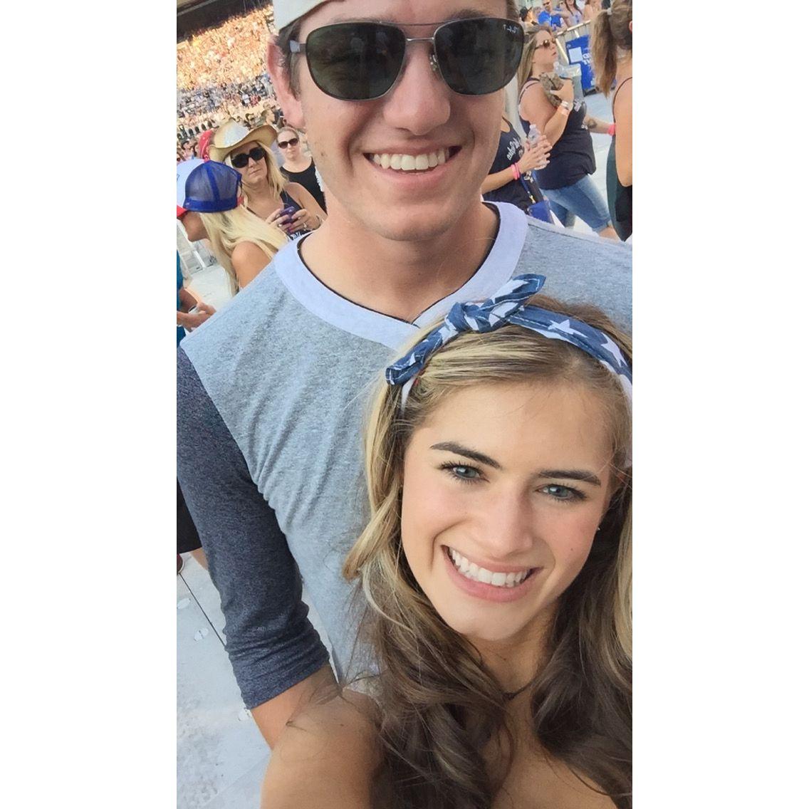 Spending time together at a summer country concert.