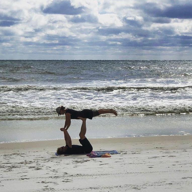 Partner yoga in Florida.