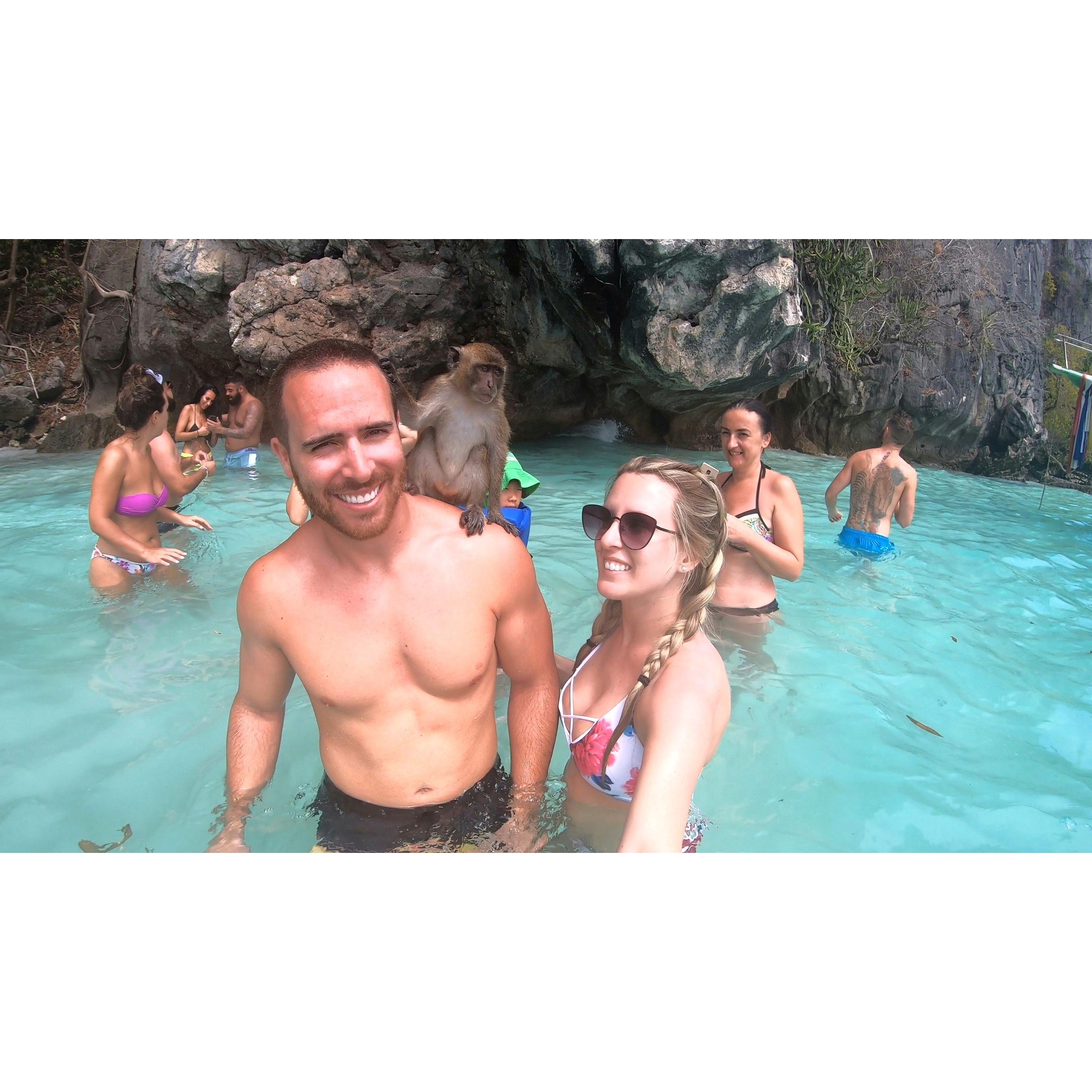 Playing with monkeys in Thailand