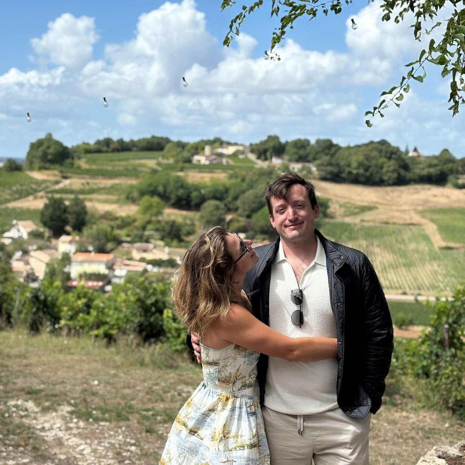 Sarah telling bad jokes looking for a laugh outside Bordeaux