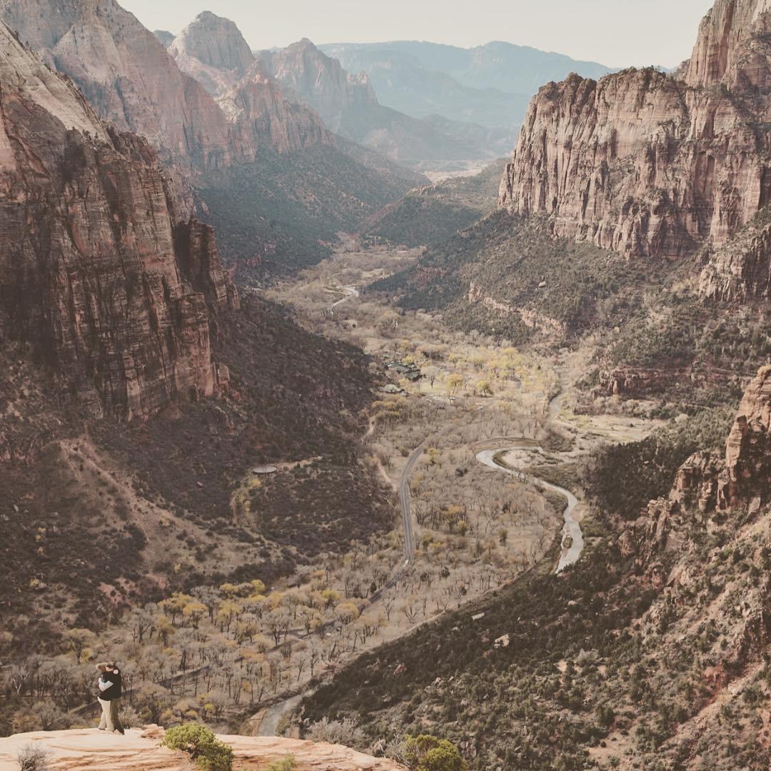 I heard several different people screaming "say yes!!" from above us before I even realized he was proposing. A friendly hiker snapped this of us at the top of Angels Landing.
