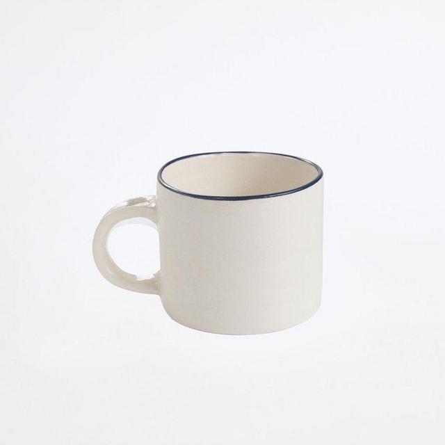 Nicholas Newcomb White Mug with Blue Rim