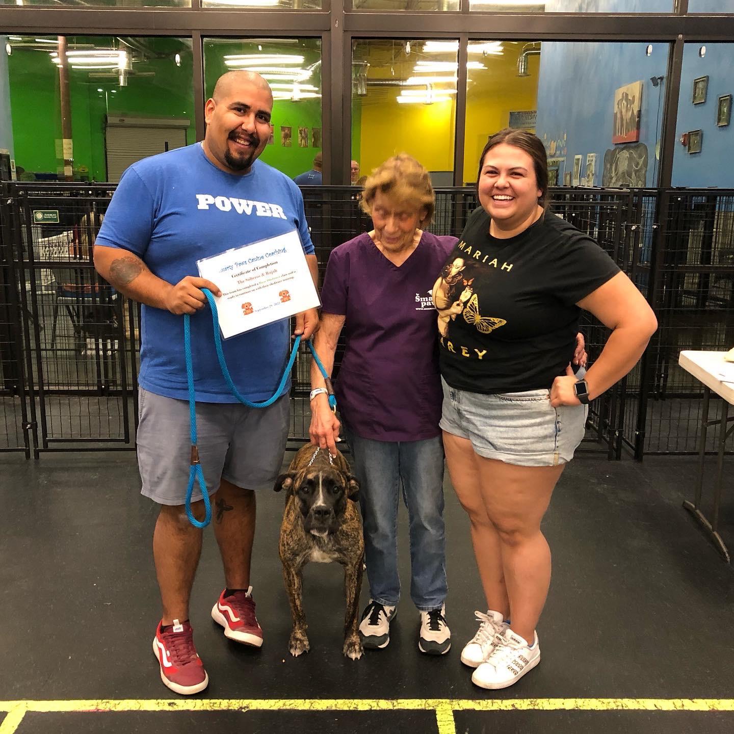 Rajah's graduation from obedience school - two proud parents.