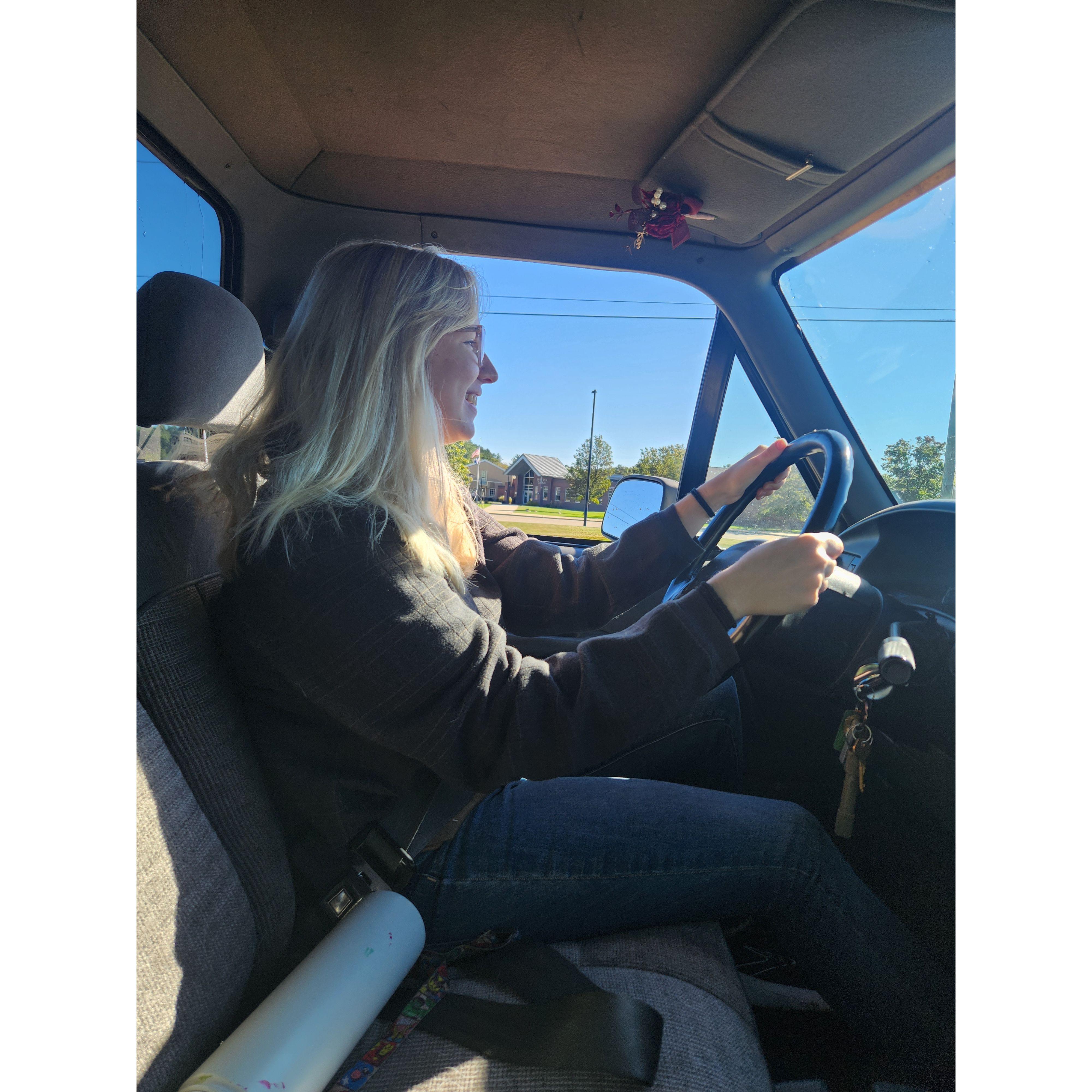 Daniel allowing Ellie to drive his truck!