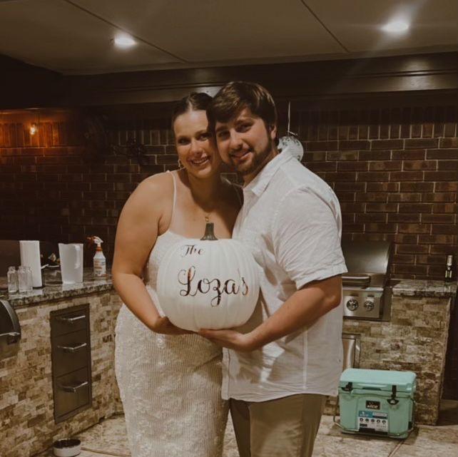 Our engagement party, holding our custom decor