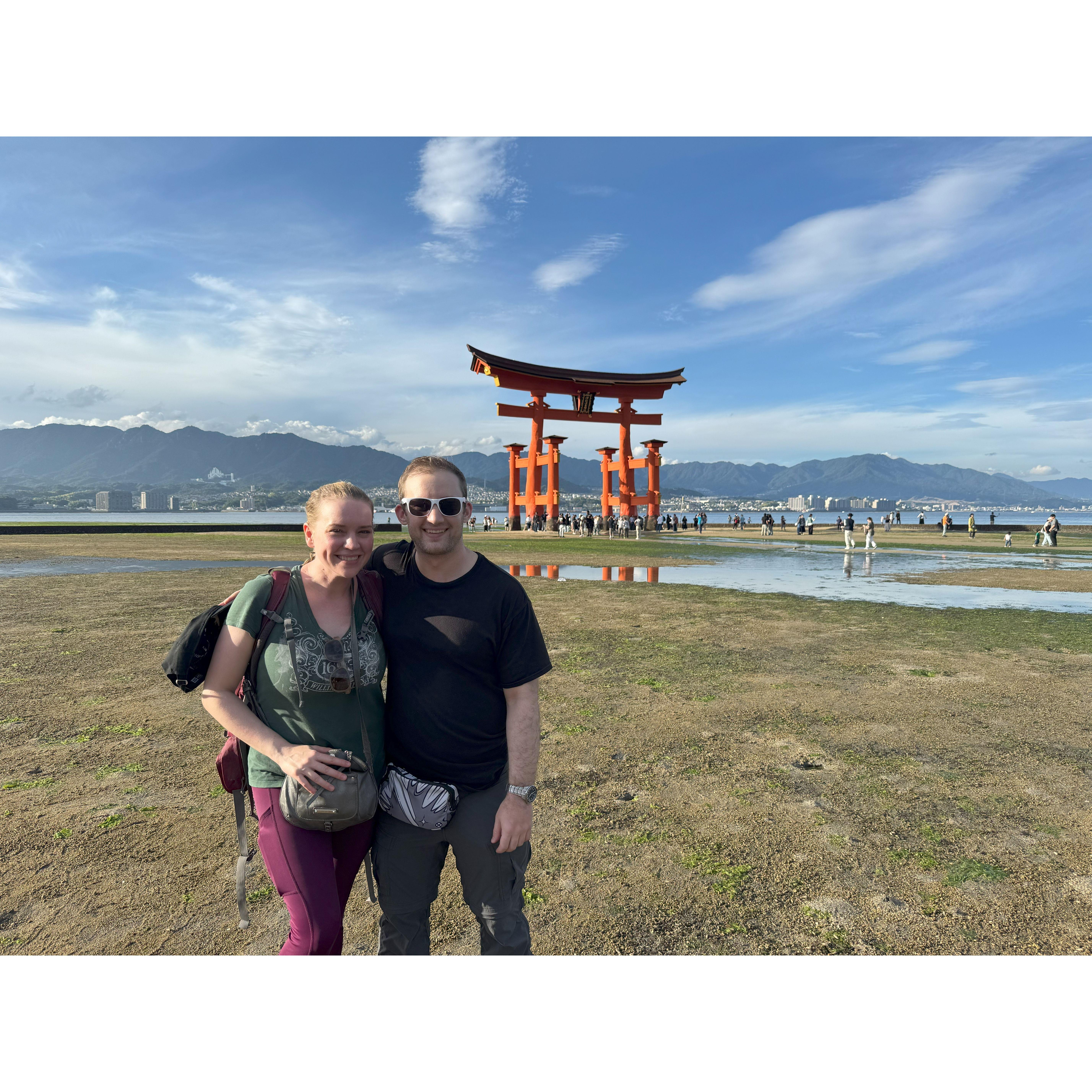Enjoying the "floating" torii gates at low tide in Miyajima