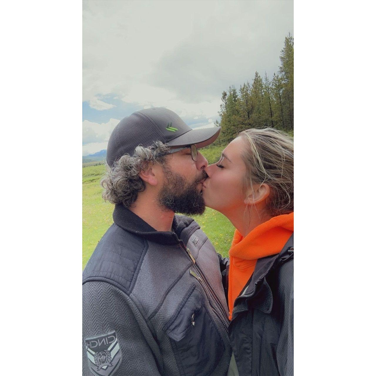 This kiss was taken the first time Brandon took Khristen out west to his favorite area where they now love to camp and fish.