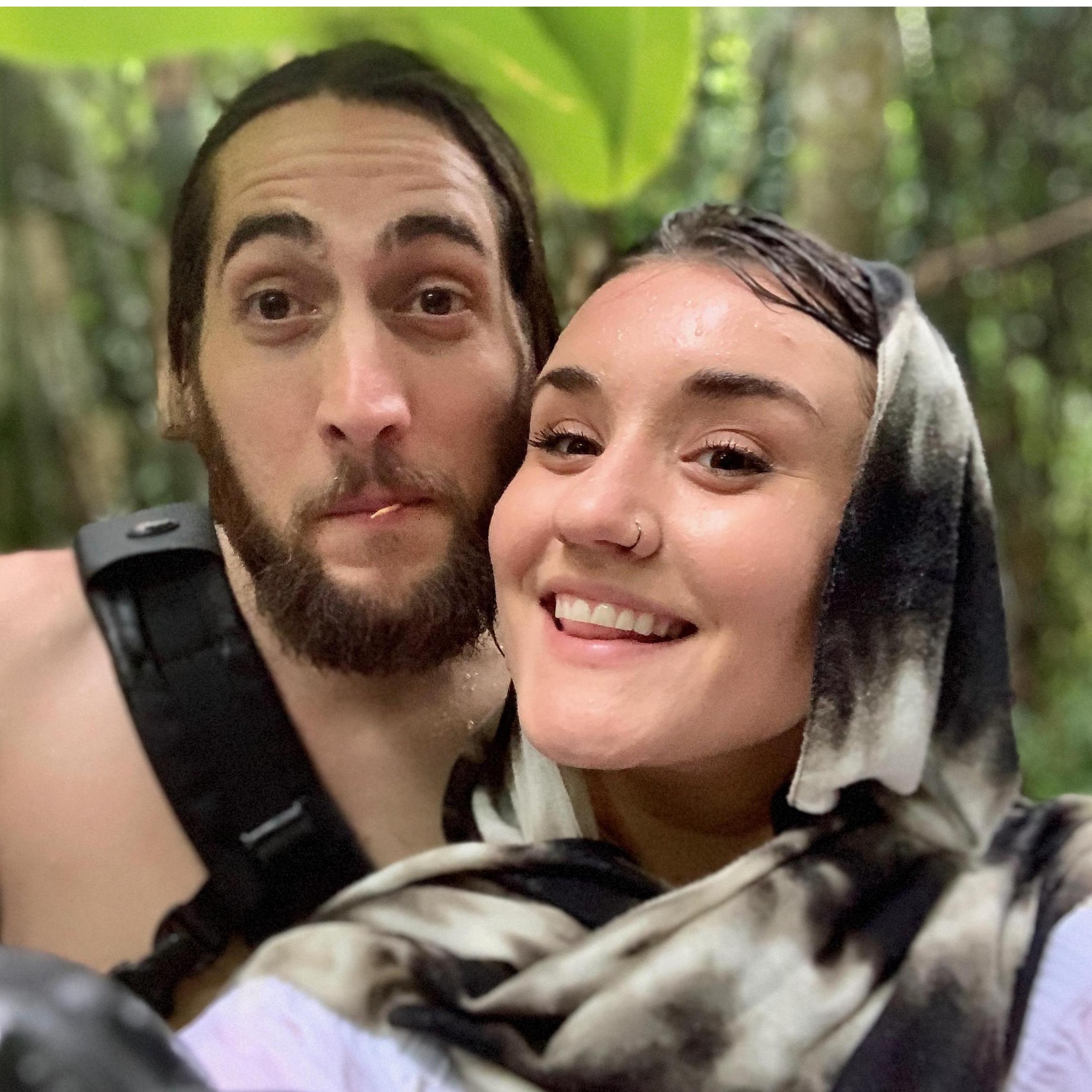 Soaking wet and happy as can be after hiking down to an underground waterfall in Bali